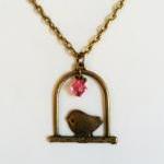 Antique Bronze Bird Swing Necklace